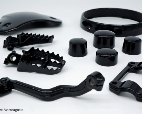 Triumph Scrambler Teile schwarz glänzend Triumph Scrambler Teile mit Pulverbeschichtung in schwarz glänzend