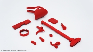 Waffenbeschichtung von Anbau- und Kleinteilen eines HAENEL-AR's in UMSC-RED.